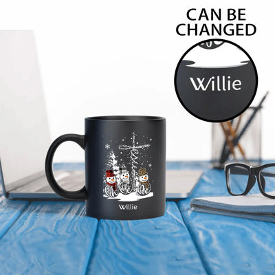Personalized Christmas Snowman Coffee Mug - Black, on desk with laptop and "Willie" name | Our Phoenix Rise