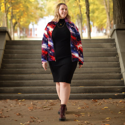 Patriotic Star Bomber Jacket - Woman wearing red white blue bomber jacket over black dress in park | Our Phoenix Rise