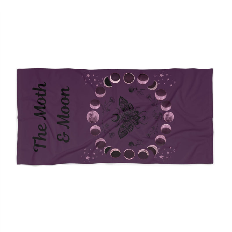 Moth with lunar phases beach towel