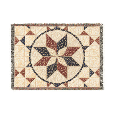 Beige woven throw blanket with blue and brown geometric star pattern top view | Our Phoenix Rise