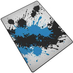 Blue Black Paint Splatter Area Rug - angled view of vibrant abstract pattern | Our Phoenix Rise