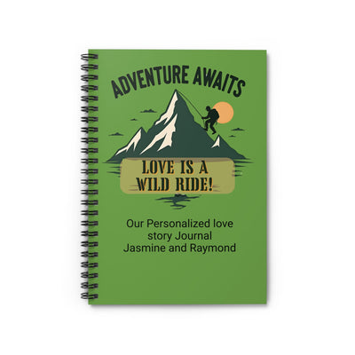 Green notebook with mountain design and text 'Adventure Awaits, Love is a Wild Ride!' on a white background