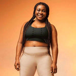 Endurance Longline Sports Bra - Black, front view, plus size model smiling | Our Phoenix Rise