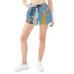 Paint Splatter Athletic Shorts - model standing with hands in pockets | Our Phoenix Rise