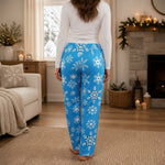 Womens Snowflake Pajama Pants - Blue Lifestyle Mockup in Cozy Home Setting | Our Phoenix Rise