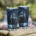 Blue Moon Wolf Insulated Travel Mug - front view, mountain lake background | Our Phoenix Rise