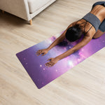 Purple galaxy printed yoga mat flat on floor with person stretching forward | Our Phoenix Rise